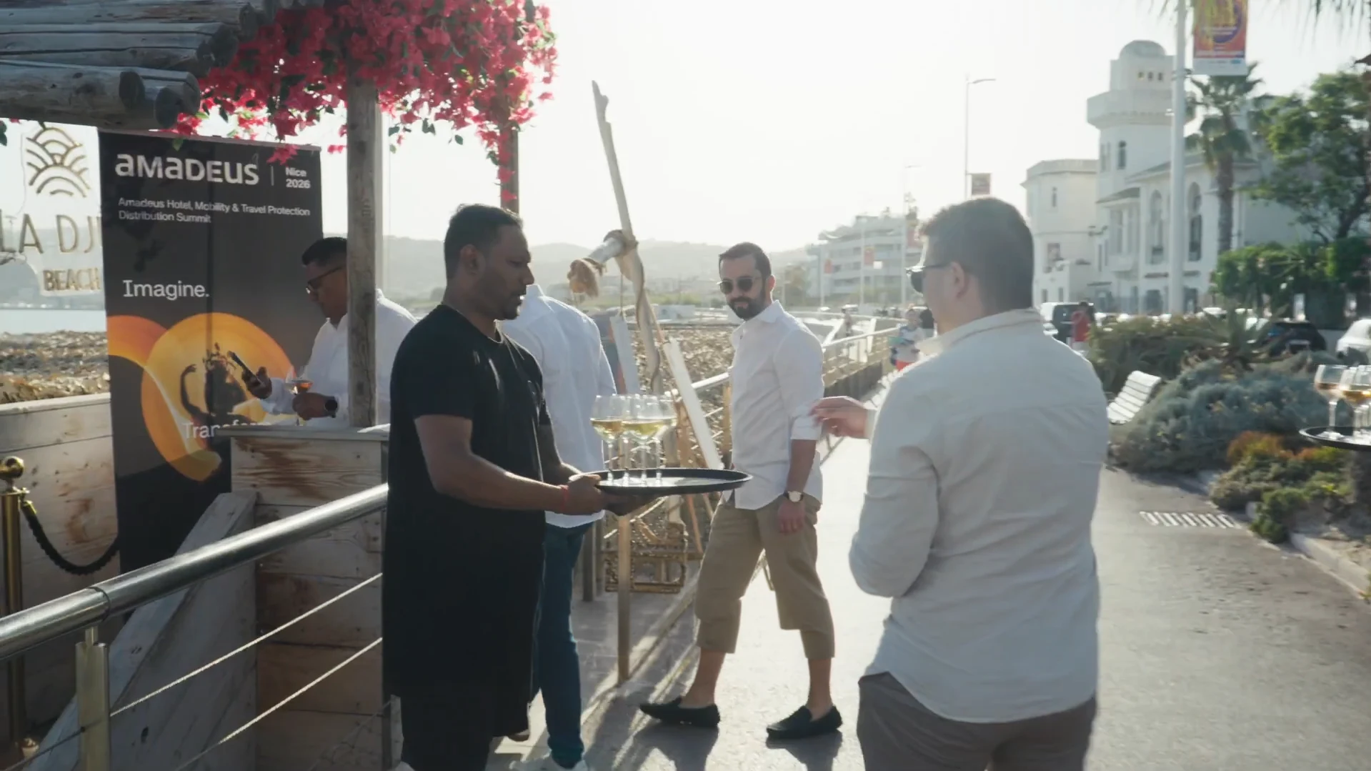 Summit guests at the beach event