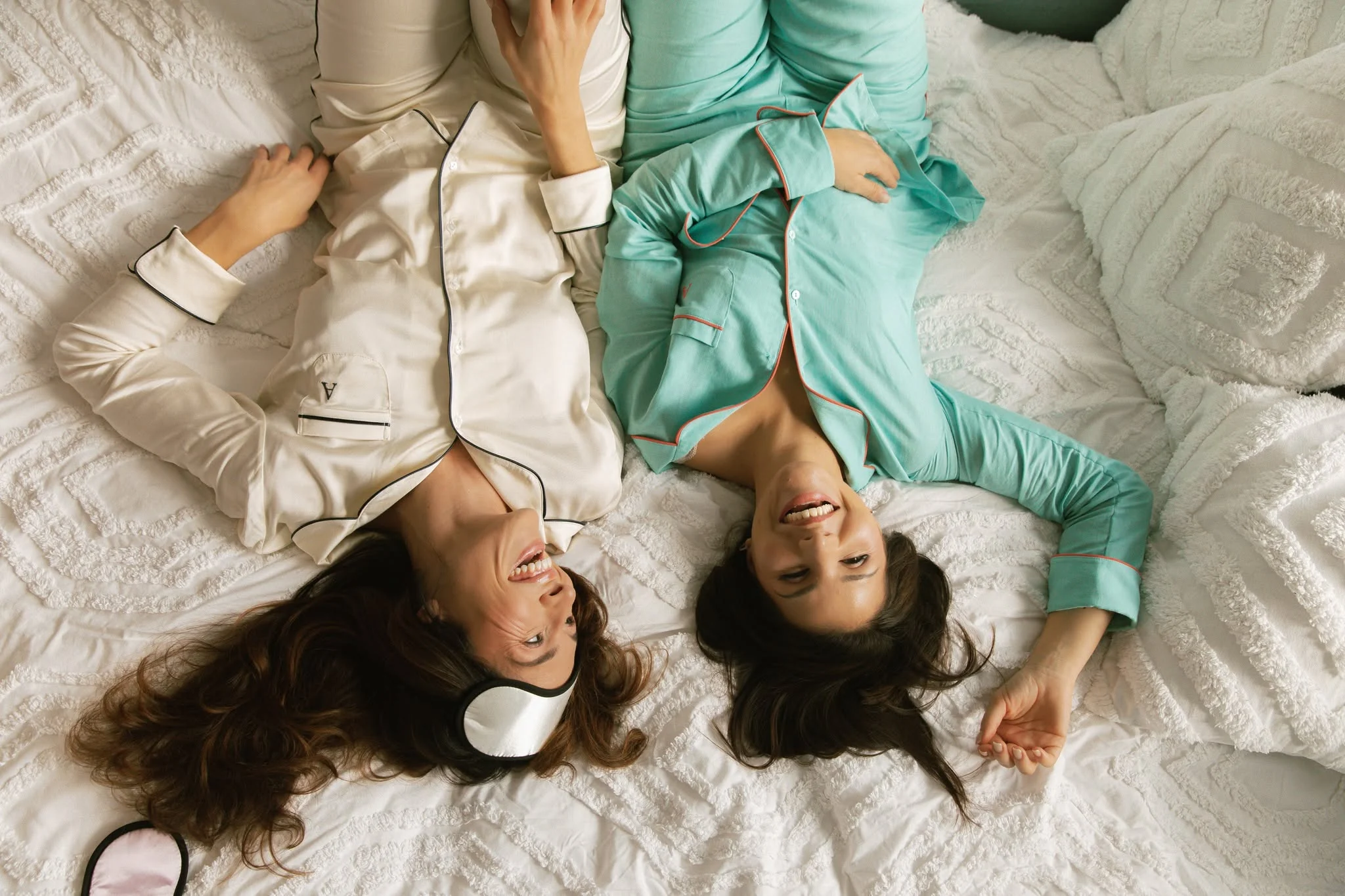 Aqva loungewear on a bed