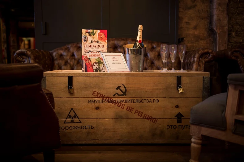 Champagne bottles in a stencilled wooden crate