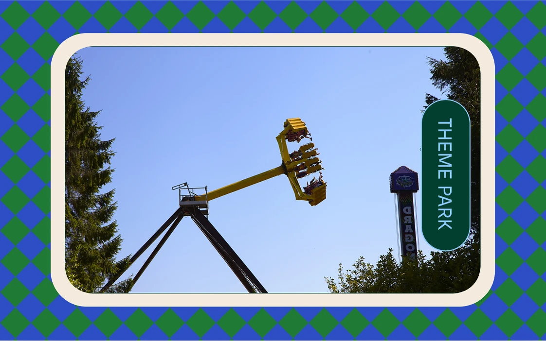 Fairground ride card in a green and blue diamond frame, tabbed Theme park
