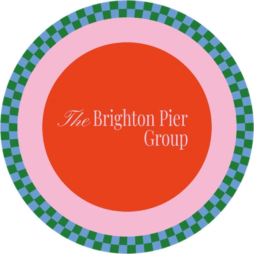 Coaster: red centre, pink ring, green and blue chequered border