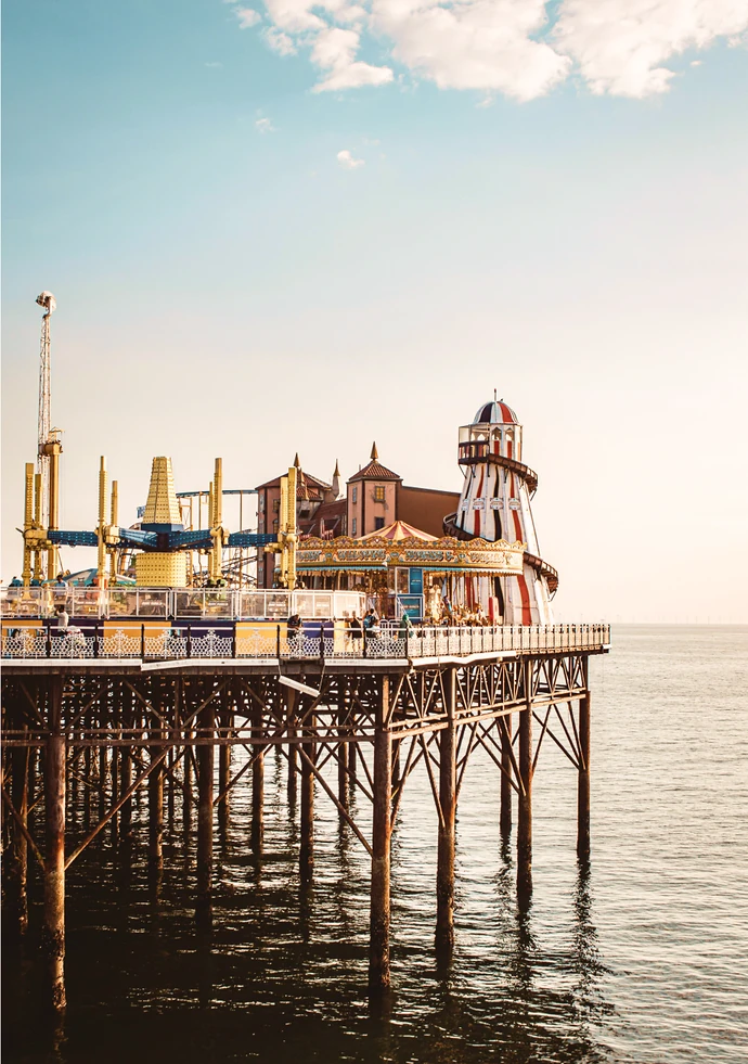 The pier's helter-skelter and pavilions silhouetted at sunset