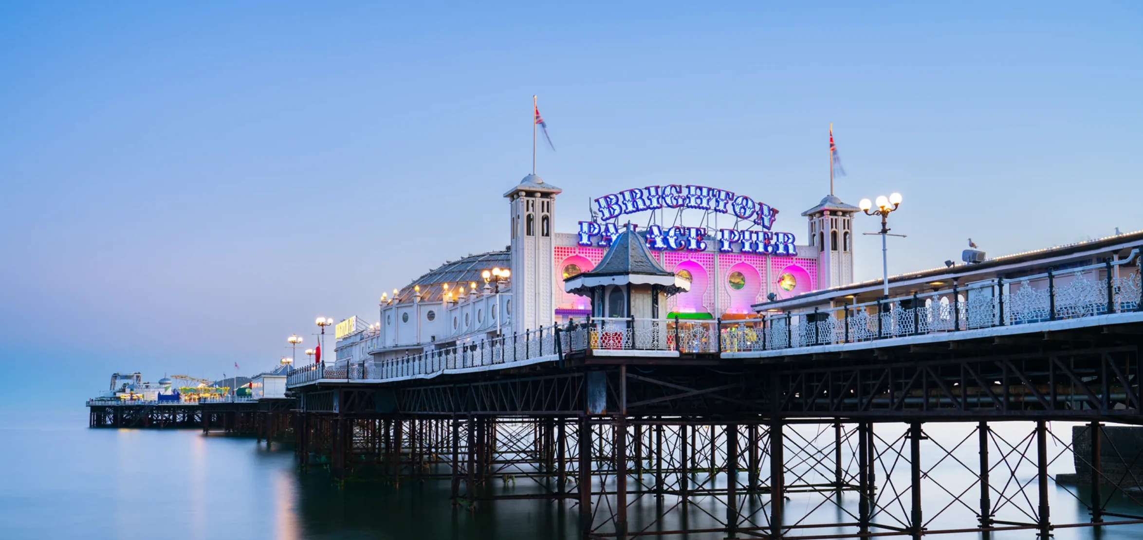 Brighton Palace Pier at dusk on the site's home page