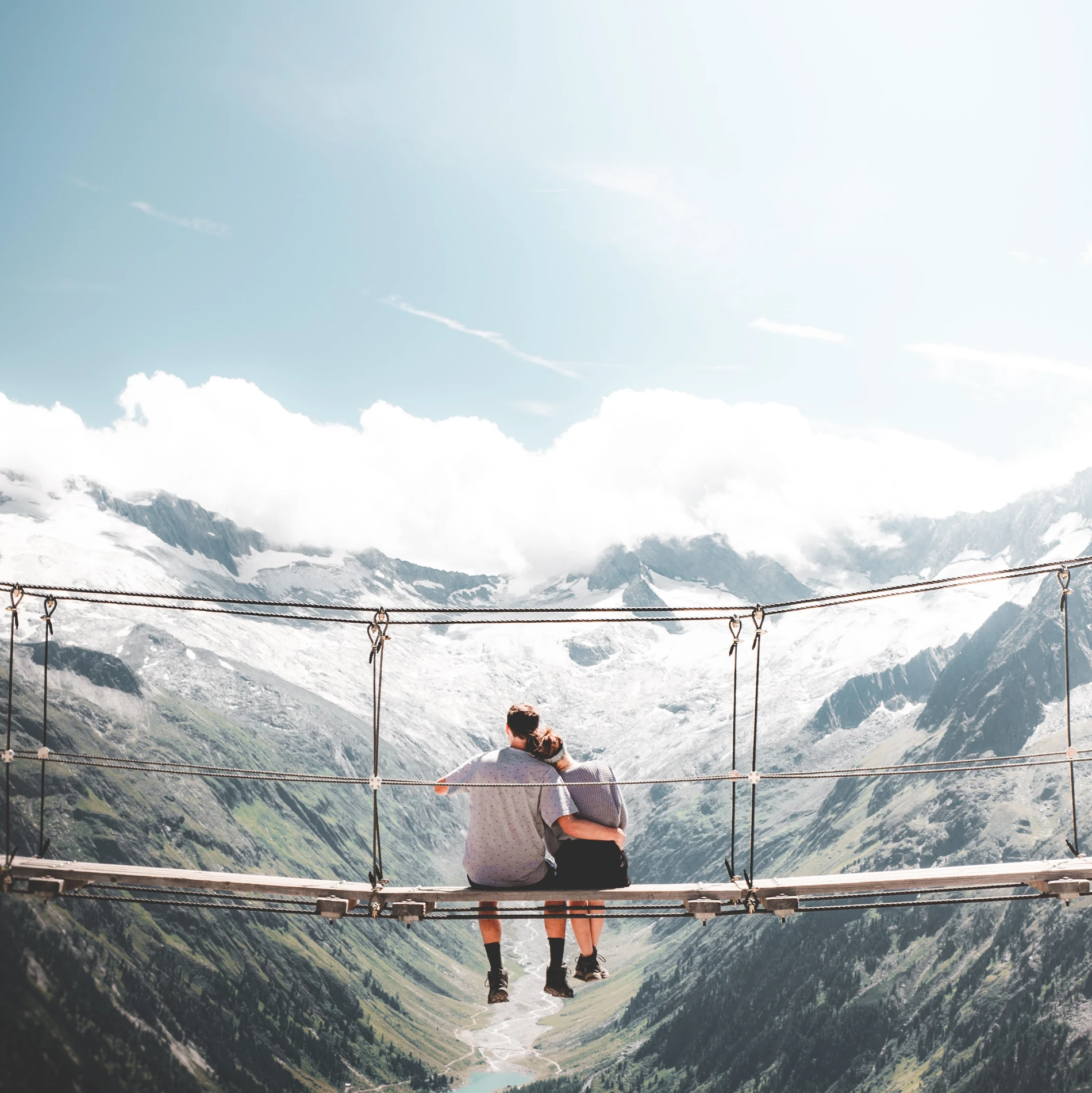 Traveler crossing a bridge