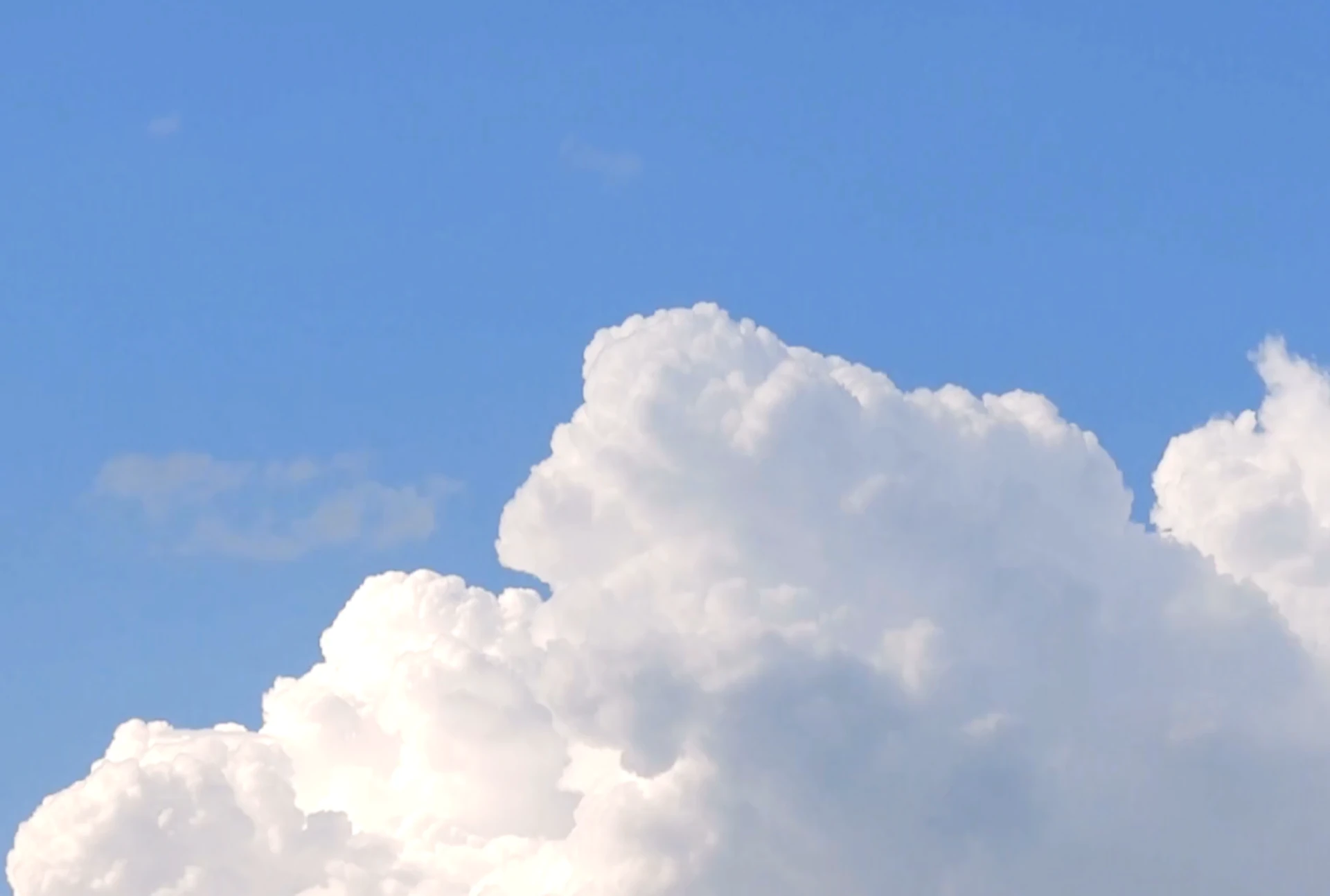 Billboard against a blue sky
