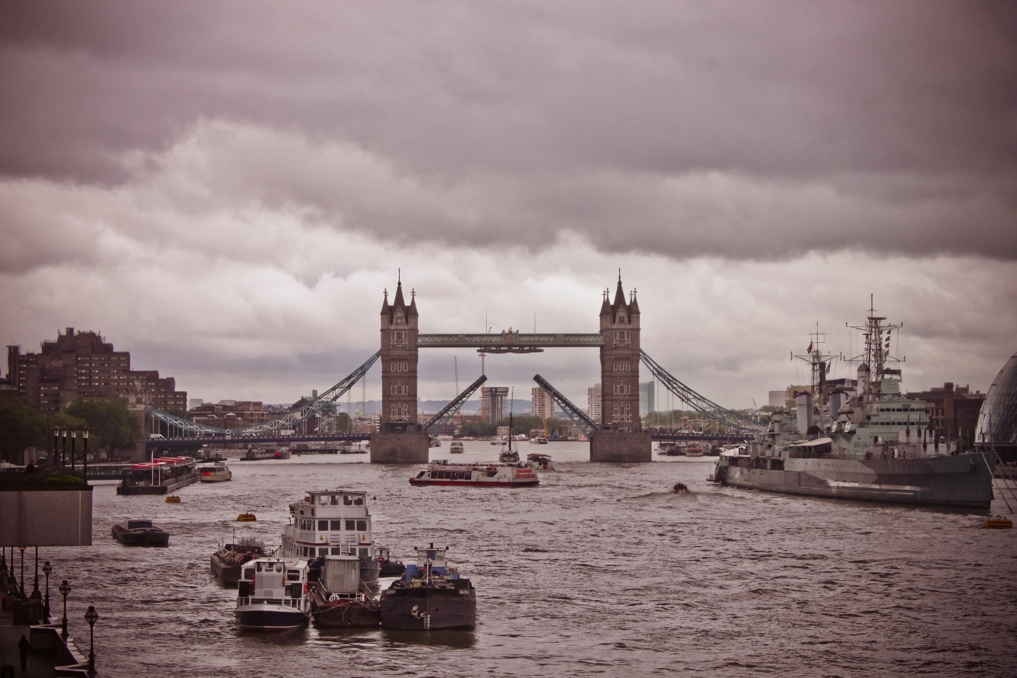 Tower Bridge, London, behind a browser window showing lcam.org.uk