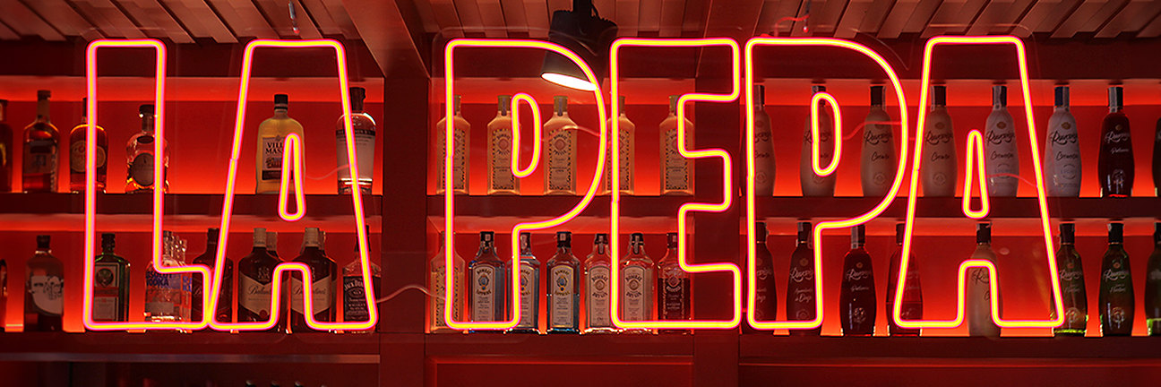 La Pepa neon sign above the bar