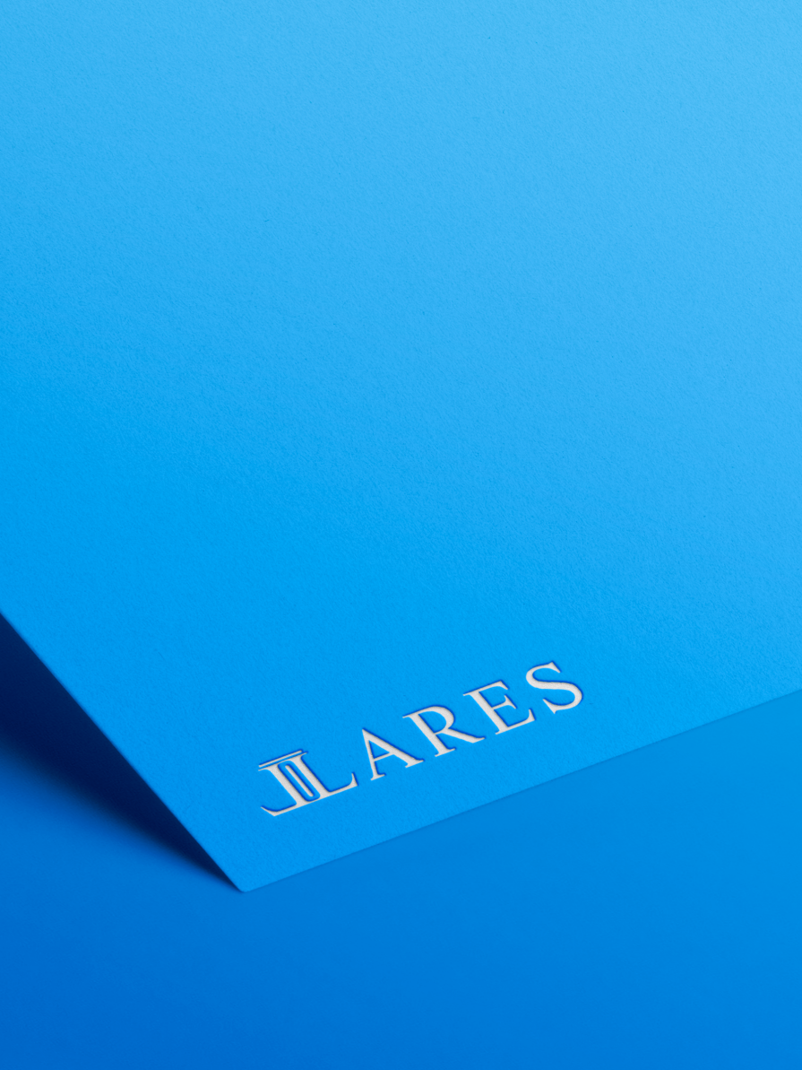 Embossed Lares collateral