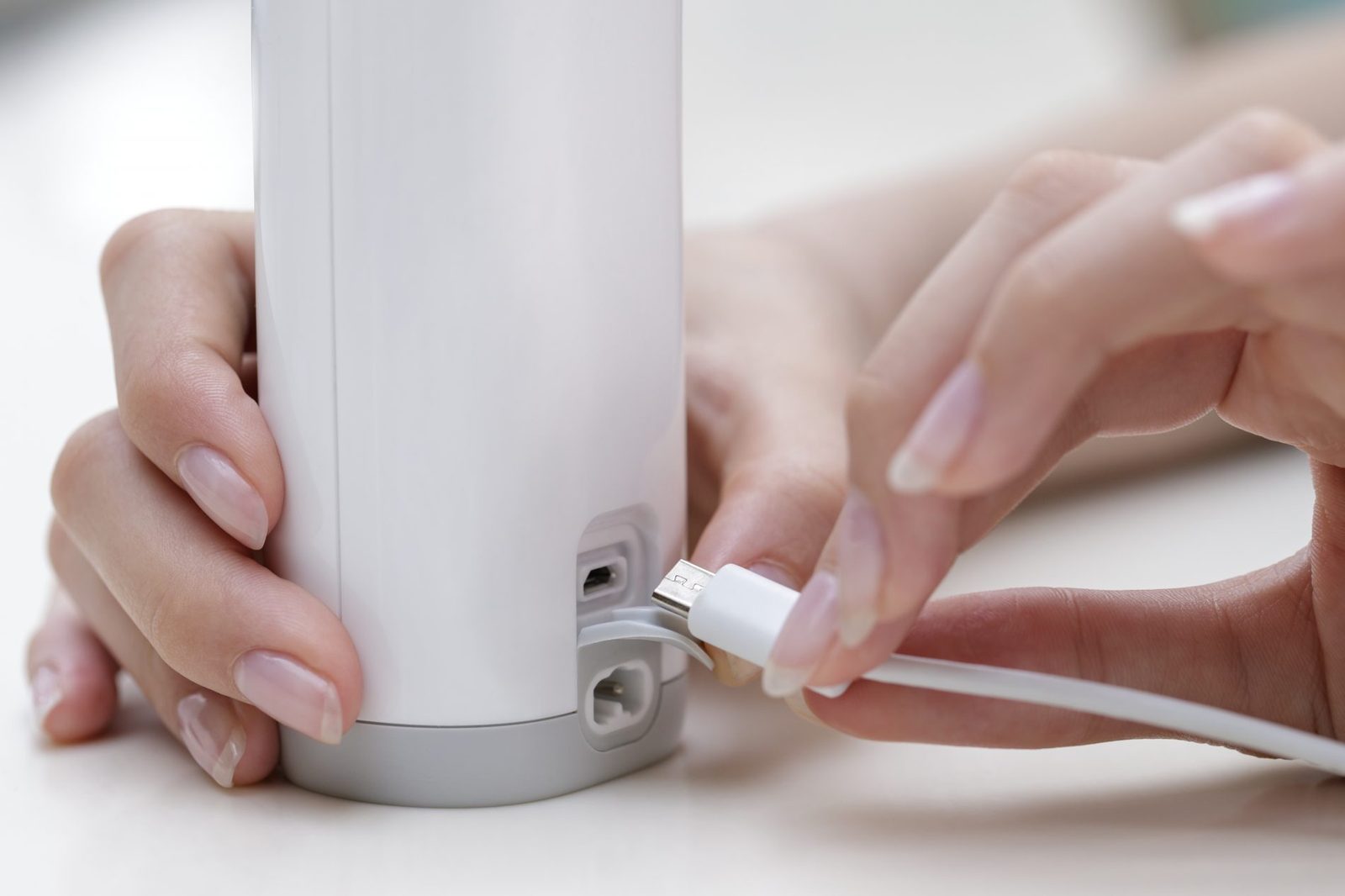 I-neb device resting on its charger