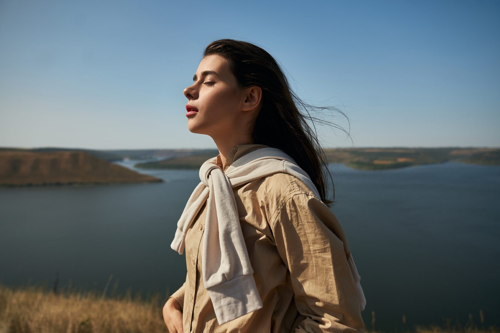 Woman breathing fresh air in nature