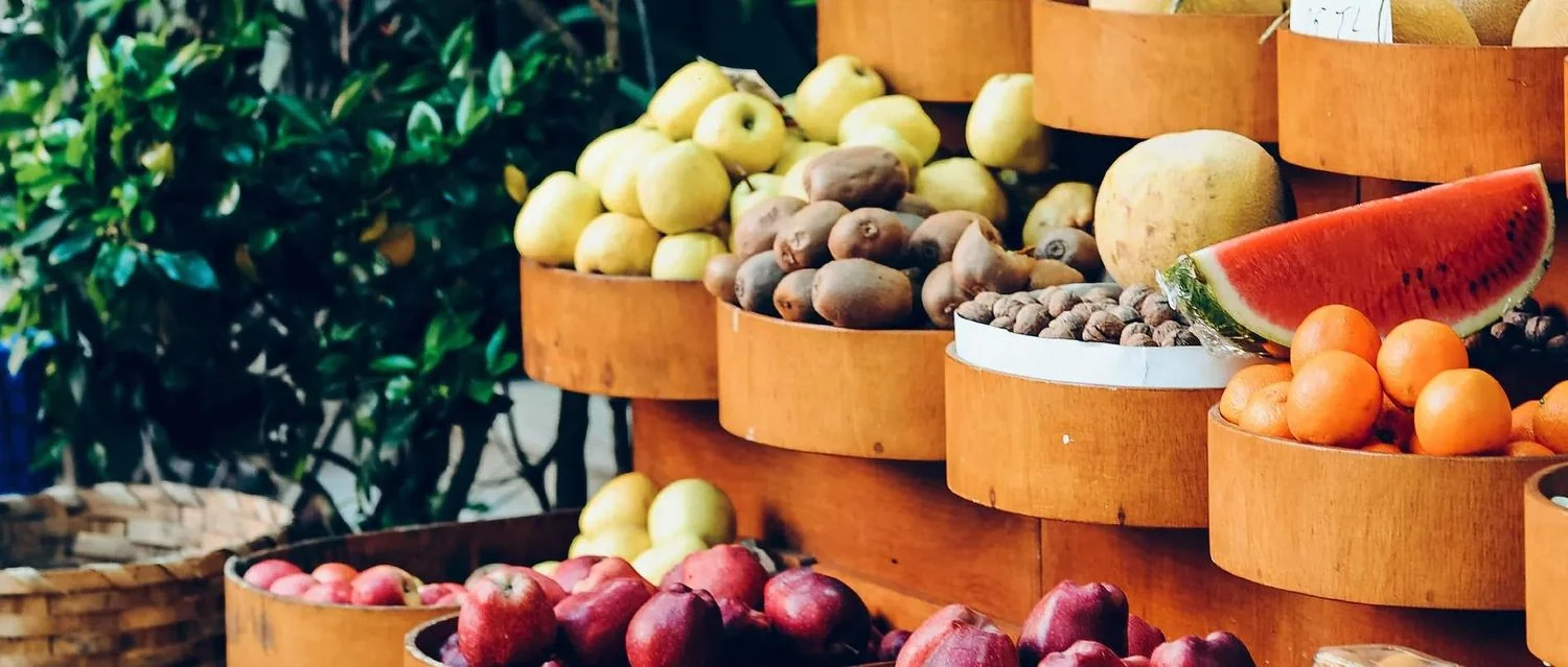 Fresh fruit on display at a market stall