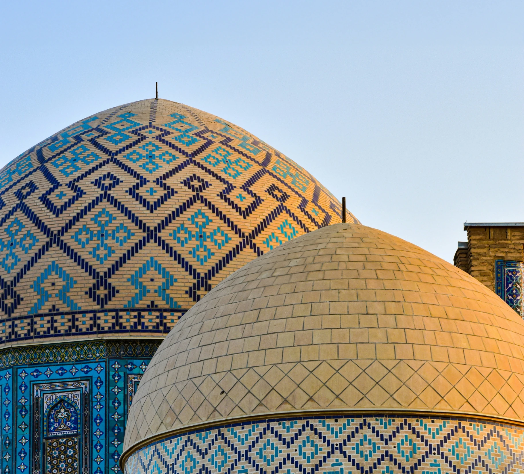 Mosque photograph behind the EMEA carousel cards
